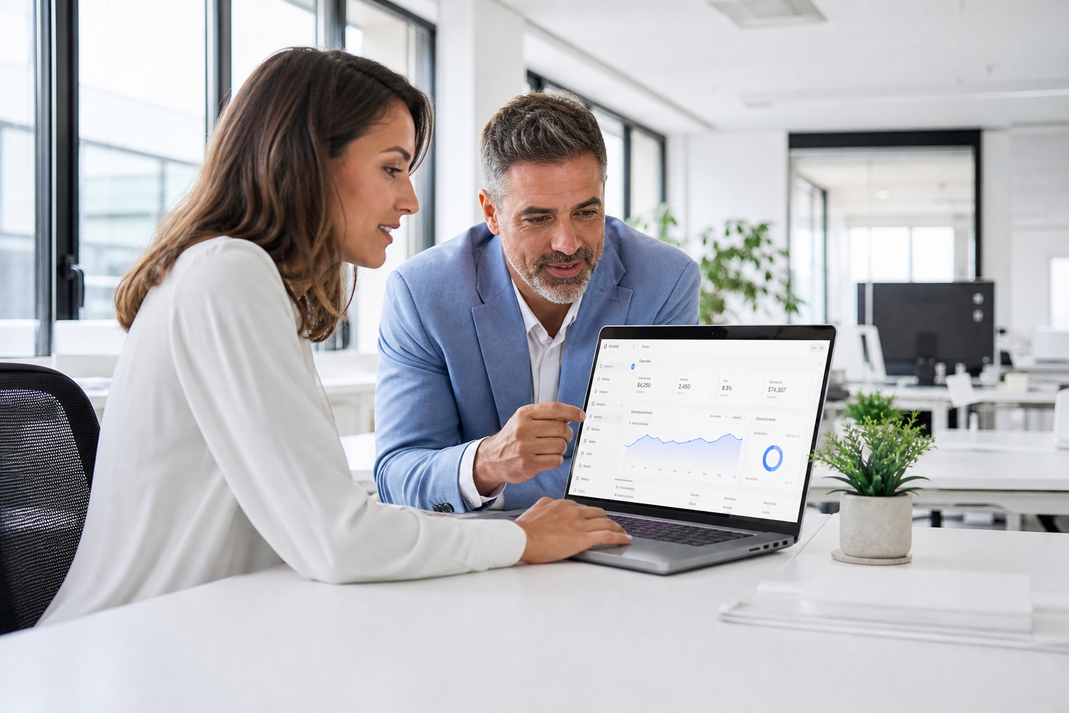 Team reviewing AI-assisted workflows on a light analytics dashboard in a bright office