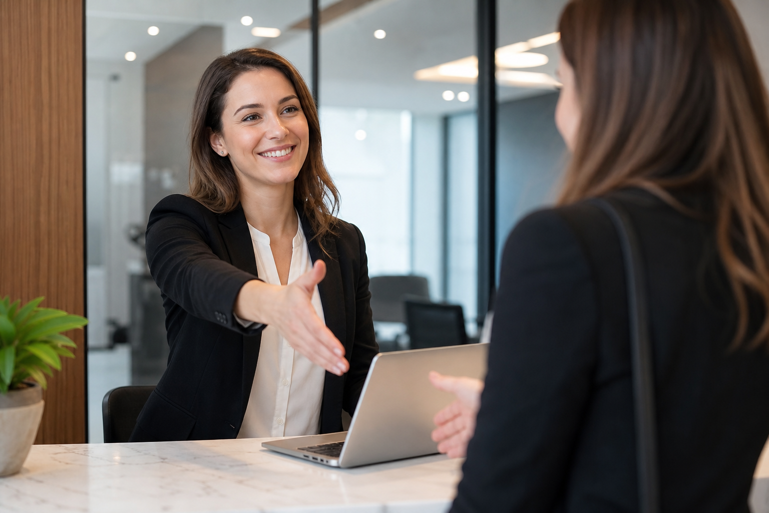 AVYRION consultant welcoming a client at the office